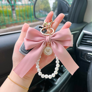 创意蝴蝶结珍珠链钥匙扣女性时尚包包挂件汽车钥匙链个性飘带领结