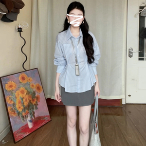 法式气质收腰蓝色条纹长袖衬衫上衣女2024新款高级感独特别致衬衣