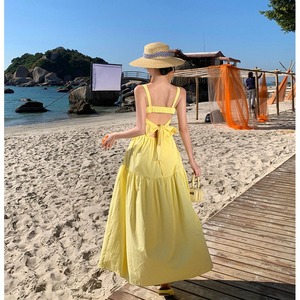 法式沙滩裙夏季吊带长裙海边度假风海滩裙子氛围感露背黄色连衣裙