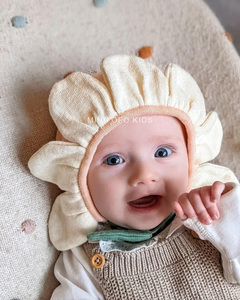 新款宝宝帽子婴儿童纯棉针织可爱花瓣帽护耳满月周岁毛线帽四季款