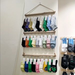 创意袜子展示架上墙挂壁式袜架服装店专用挂墙货架原木饰品收纳架