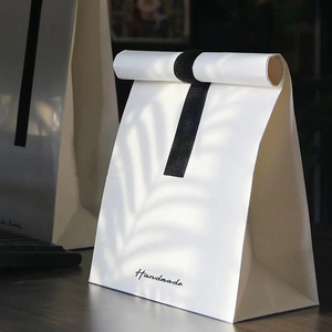 创意白色牛皮纸手提袋商务风礼品袋高档糖果包装袋定制伴手礼袋子