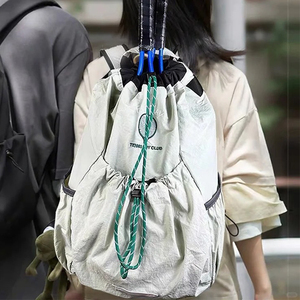 日本乐天羽毛球包抽绳双肩包帆布大容量书包爬山骑行网球包网球袋