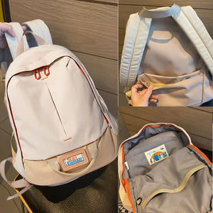 日本书包新款双肩包女通勤休闲电脑背包白色旅行防水个性帆布包潮