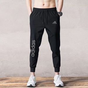 Adidas阿迪达斯裤子男春夏款三叶草休闲运动长裤收口束脚潮流卫裤