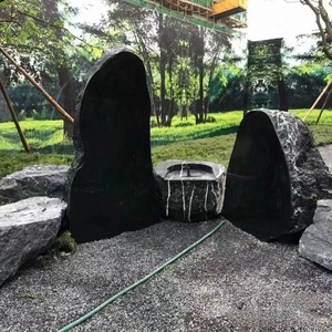 黑山石原石也可定制各种造型尺寸龙门镜面对劈石石桌片石园林造景