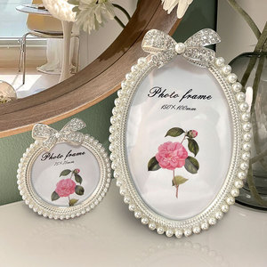 欧式珍珠相框摆台 3六6七7寸创意蝴蝶结床头柜可爱宝宝照片框组合