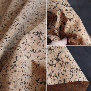 进口立体仿真皮pu皮革木纹面料纯天然柔软肌理黑色块设计师布料