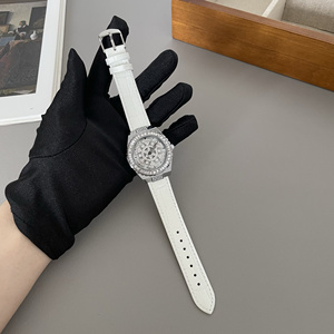 DM1满钻时尚旋转设计表盘真皮带女士手表时来运转系列白色皮带表