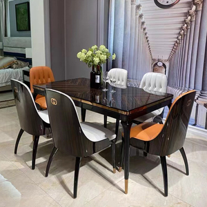 后现代港式轻奢真皮餐桌椅组合意式小户型长方形饭桌实木烤漆家具