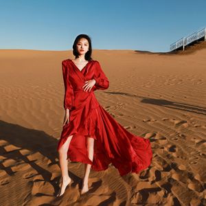 西藏丽江三亚旅游穿搭露背海边度假长裙显瘦遮肉红色沙漠连衣裙仙