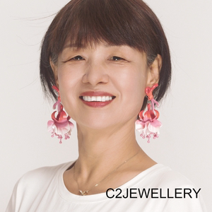 C2JEWELLERY原创设计蝴蝶结花朵倒挂金钟粉色长款度假风耳夹耳环