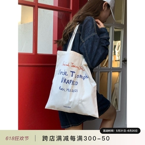 芝士商店~韩国设计感包包女夏天慵懒风白色单肩帆布包小众帆布袋