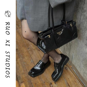香港代购黑色真皮包包女2024夏季新款高级质感小众轻奢法棍手提包