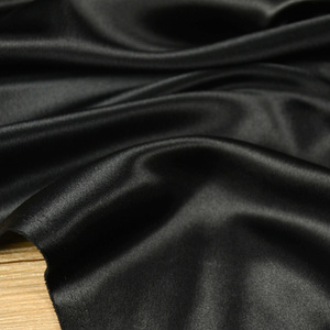 日本进口纯黑色缎面布料 柔软顺滑不透光泽 衬衣连衣裙裤子面料