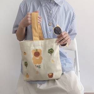 韩国ins可爱卡通手提包日系一根带手拎帆布包早餐便当袋学生小包