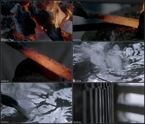 炭火火炉打铁烧红铁铸造兵器淬火抚摸刀刃高清实拍视频素材