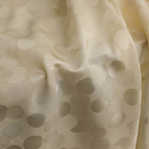 重磅米杏色织锦缎交织波点提花真丝棉混纺面料设计师布料