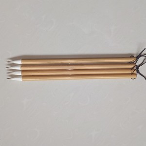 今天做出来的新款毛笔，笔杆用天然兰竹，笔头采用东北狼尾与羊毫