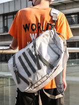 Hong Kong flagship casual shoulder bag male large capacity canvas high school student bag female Korean version of mens travel backpack