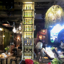 Wrought iron wall-mounted wine rack column luminous solid wood wall shelf restaurant display wall red wine rack wine cabinet customization