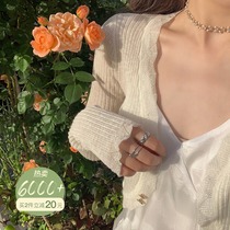 Lin Shanshan summer micro-transparent cicada wing cardigan womens sunscreen air conditioning shirt gentle pure desire wind loose short knitted top