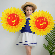 Opening of the Games holding flowers red flag sunflowers smiley face sunflower chorus red song props
