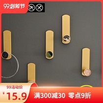 Nordic creative light luxury golden coat hook single punch-free toilet adhesive hook Xuanlian hook after closing the hook without trace