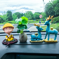 Car accessories ornaments car shaking head monk all the way to safe deer center console aromatherapy decoration new car decorations