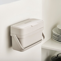 British Joseph hanging wall except taste kitchen waste bin kitchen waste containing box table top of kitchen cabinet containing barrel