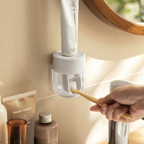 Squeeze toothpaste artifact wall-mounted automatic new household lazy squeezer-free toothbrush paste rack