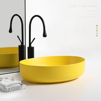 Nordic matte yellow table upper basin Oval household ceramic wash basin toilet balcony INS washbasin Basin