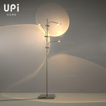 Minimalist creative LED floor lamp bedroom light and shadow standing lamp living room sofa Italian art projection sunset lamp