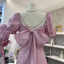 French Pearl waist dress 2021 new summer heart machine sexy leak back bubble sleeve design sense bow women