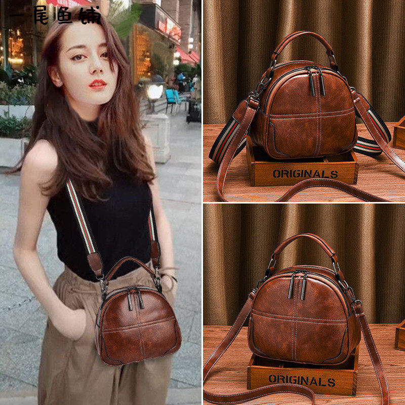 Hong Kong Minority 2021 new product Baiyi womens ins small bag womens bag fashion broadband tote shoulder stiletto bag