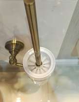 The toilet brush is a