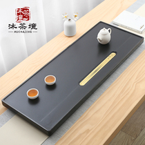 Mu tea environment natural Wujin Stone tea tray household simple stone tea table whole large drainage light luxury modern tray