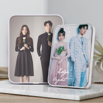 Do photo frames set up tables hang wedding certificates on the wall family portraits high-end photo studios wedding photos zoom in wash photos diy customization