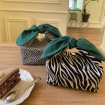 Japanese and wind pamper when bag in bag in zebra strike students with lunch bag bag