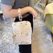 Japan diaper storage bag Baby diaper bag Hand cart Diaper diaper storage bottle Waterproof portable card