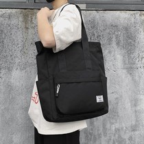 Bag mens tide portable mens Hand bag leisure Korean version of canvas bag tote portable simple student capacity rest