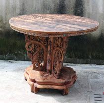 In the countryside old goods wood carving round table carved single board table antique old objects