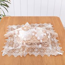 Small tea cloth covered with a covered tea cover covered by a small tea plate covered by a cloth covered by a cloth covered by a small tea plate