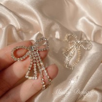 Gilt butterfly Kong Xuer same big bow earrings mosquito coil ear clip without ear hole female spiral tide autumn and winter