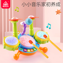 Drum instrumentalist playing professional childrens drum toys beating drums playing drums and baby drumming drumming player drum combination set