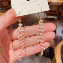 East Gate Fashion Rice Bead Chain Pearl Ear Line Long surreal Stream Su Earrings South Korean temperament Net Red Ear Decorated Female Tide
