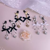 Jingle bells bow breast clip sm toy