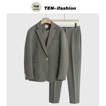 Spring thin casual suit mens suit profile Korean version of the trend two-piece loose handsome high-end suit jacket