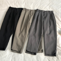 Modified leg-shaped foot mouth irregular design high waist thin semi-elastic waist nine-point Haren pants womens autumn