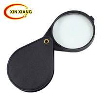 60mm copper rivet live handle folding egg-shaped magnifying glass 5 times glass lens foreign trade sales supporting gifts 1094